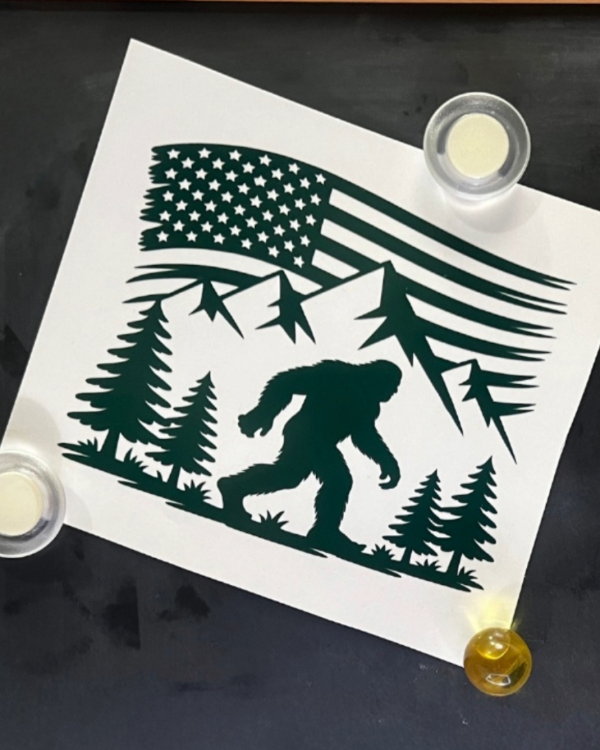 Sasquatch in the mountains and flag